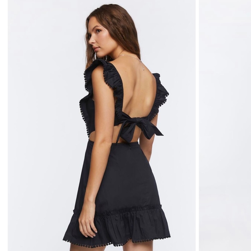 Super cute black cutout flounce mini dress!